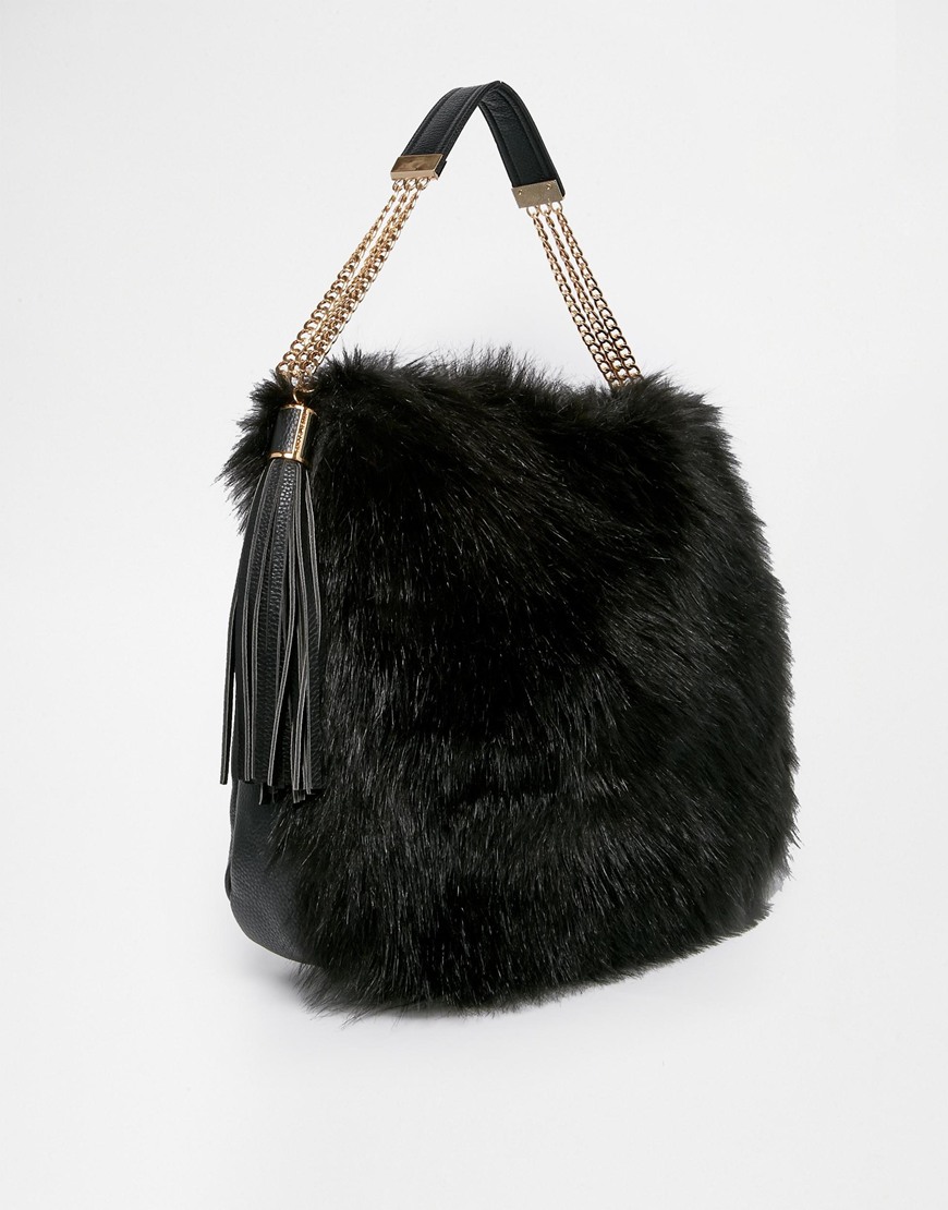 1. River Island Black Fur Slouch - Bag at You